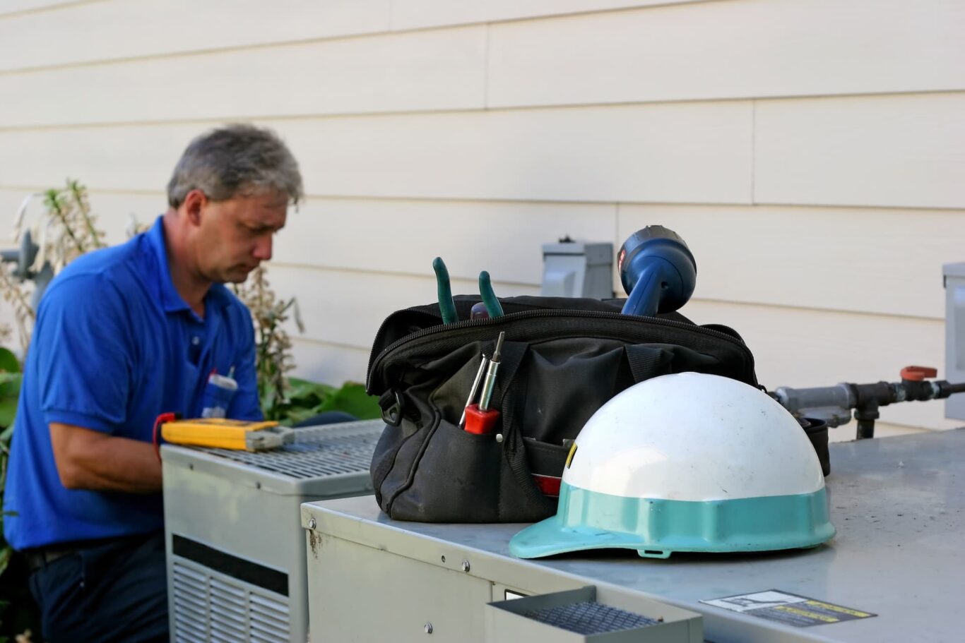 AC expert performing regular maintenance